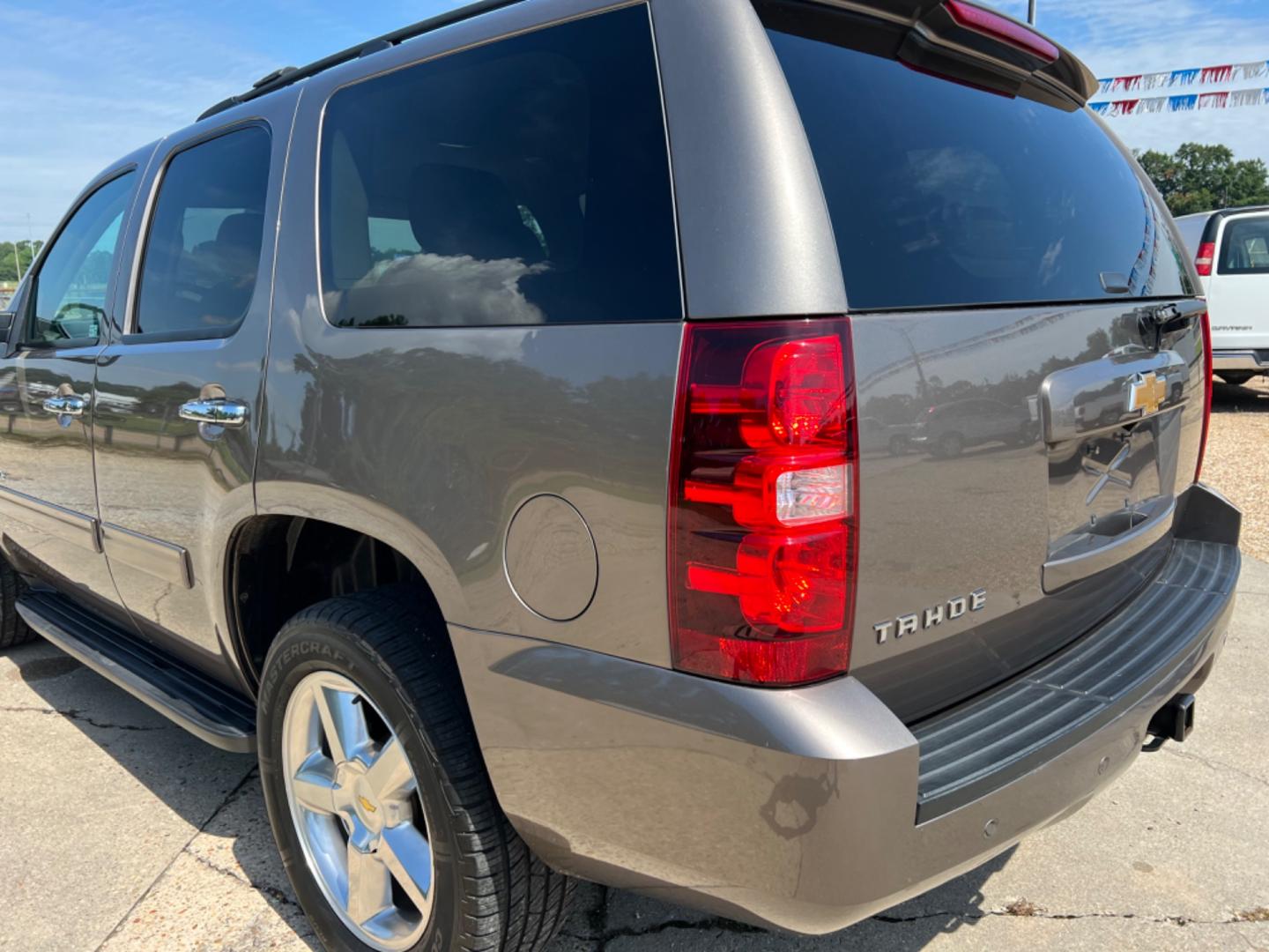 2014 Brown /Tan Chevrolet Tahoe LS (1GNSCAE04ER) with an 5.3L V8 engine, Automatic transmission, located at 4520 Airline Hwy, Baton Rouge, LA, 70805, (225) 357-1497, 30.509325, -91.145432 - 2014 Chevy Tahoe LS 5.3 V8 Gas, 147K Miles, 8 Passenger Seating, Backup Camera, Power Windows, Locks & Mirrors, Cold A/C, Tow Pkg. FOR INFO PLEASE CONTACT JEFF AT 225 357-1497 CHECK OUT OUR A+ RATING WITH THE BETTER BUSINESS BUREAU WE HAVE BEEN A FAMILY OWNED AND OPERATED BUSINESS AT THE SAME LOCA - Photo#7